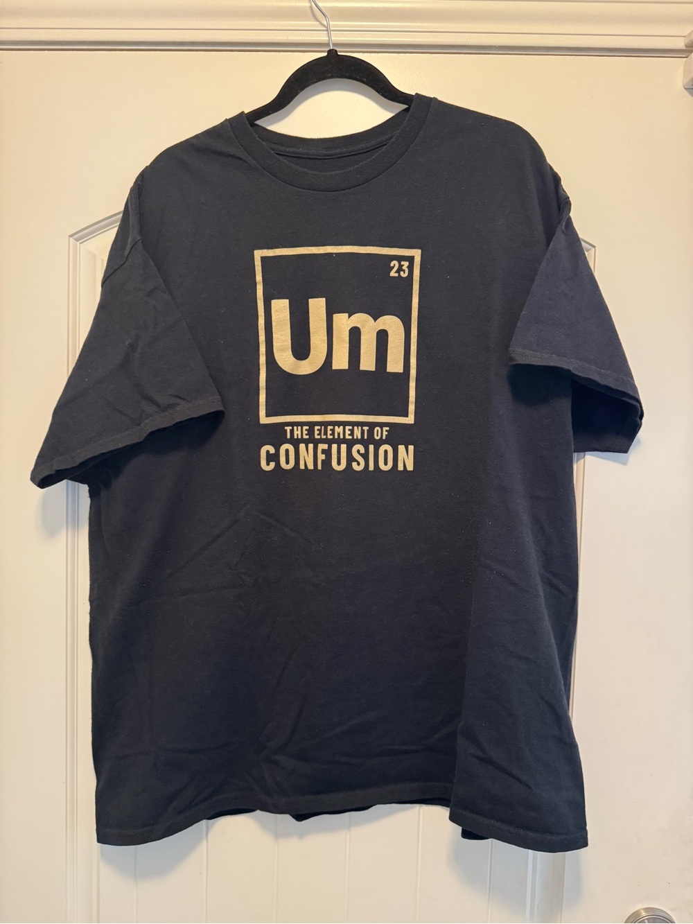 DOM Black Graphic Short Sleeve Tee with Gold 'Um' Design